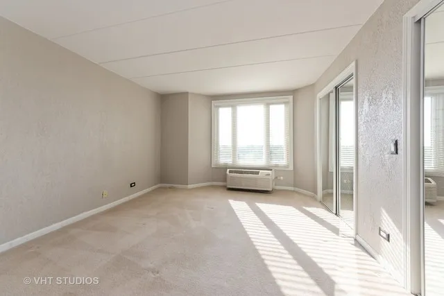 a view of a room with a large window