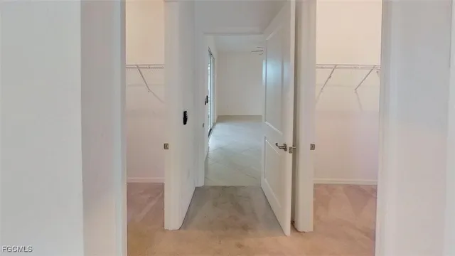 a front view of a building with sitting area