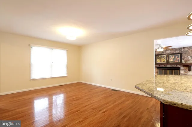 a view of an empty room and window