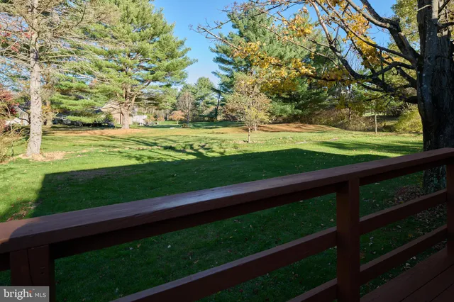 a view of a yard with an outdoor space