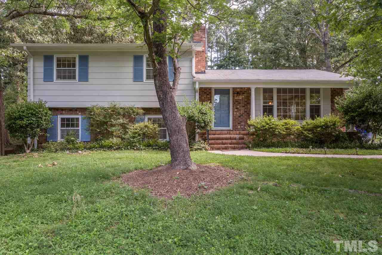 1547 Fountain Ridge Road Chapel Hill, NC 27517 - Photo 2 of 22 a front view of house with yard and green space