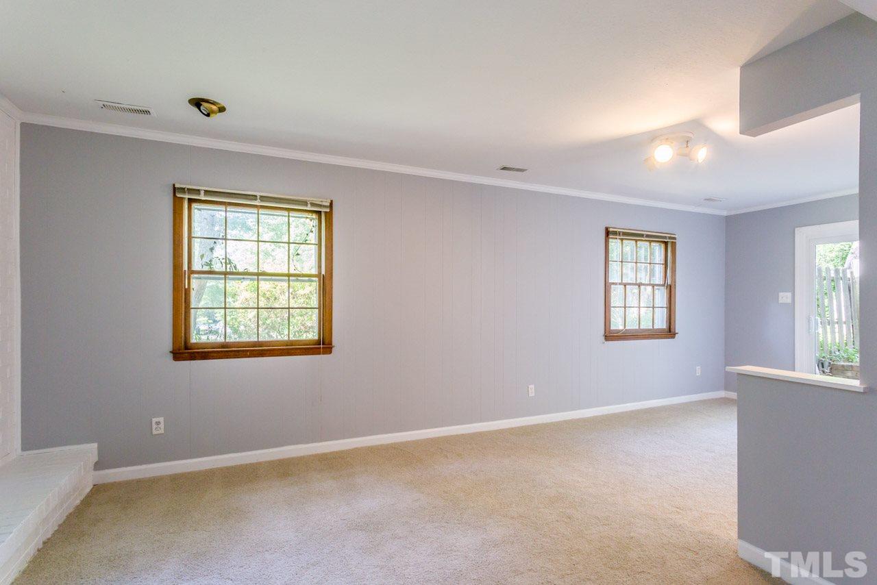 1547 Fountain Ridge Road Chapel Hill, NC 27517 - Photo 12 of 22 a view of an empty room with a window