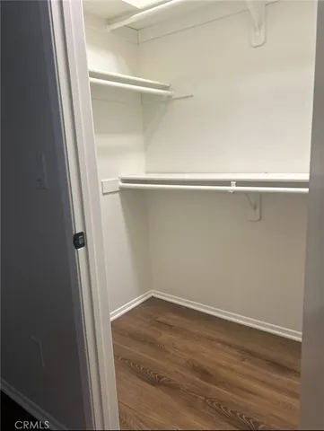 a view of an empty walk in closet