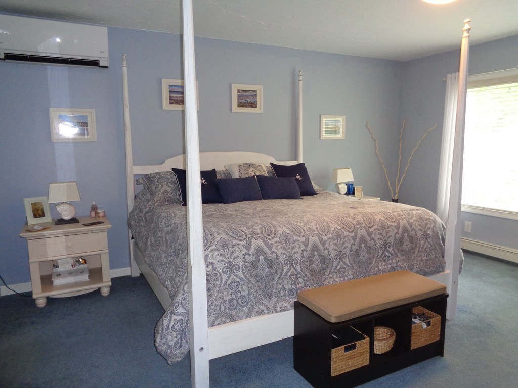 5 Cooper Road Sturbridge, MA 01566 - Photo 17 of 28 a bedroom with two beds and a window
