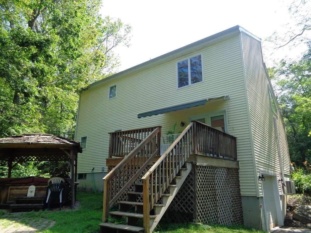 5 Cooper Road Sturbridge, MA 01566 - Photo 3 of 28 a view of house with swimming pool and deck