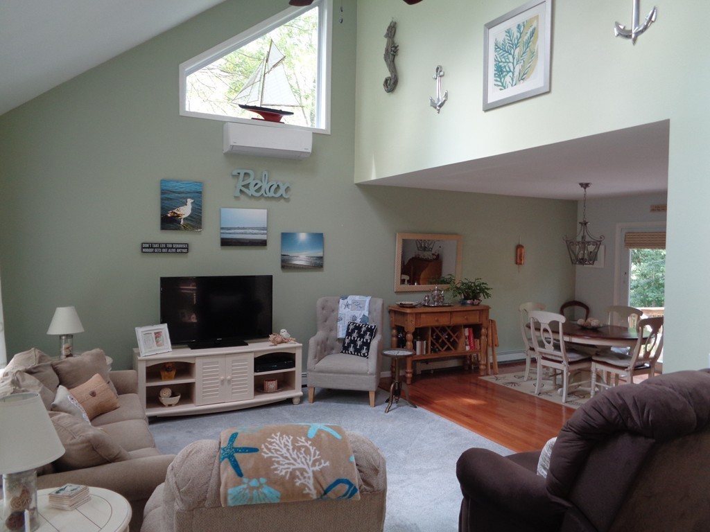 5 Cooper Road Sturbridge, MA 01566 - Photo 7 of 28 a living room with furniture and a fireplace