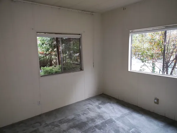 a view of a room that has a window