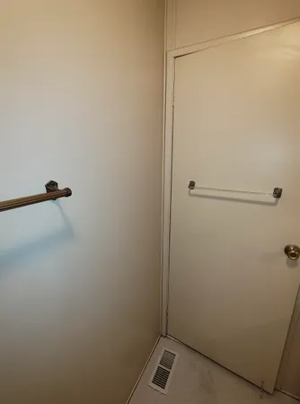 a bathroom with a sink a mirror and a shower