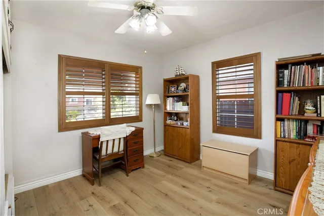 a room with furniture and a book shelf