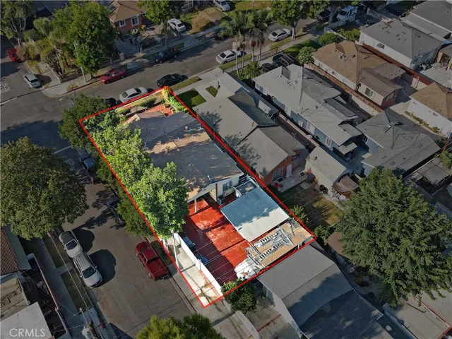 an aerial view of residential house with outdoor space