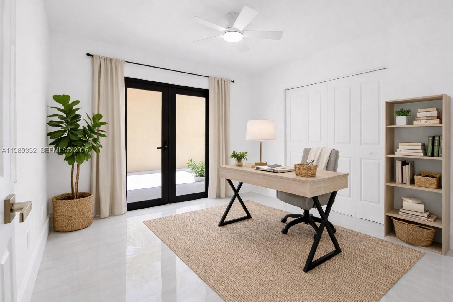8961 Southwest 6th Street Miami, FL 33174 - Photo 11 of 26 a view of a livingroom with furniture and a potted plant