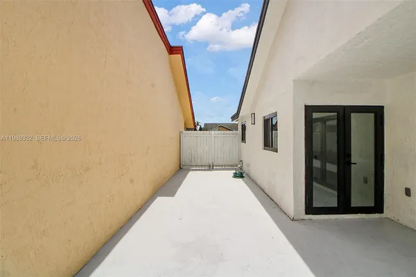 a view of balcony with wooden floor and stairs