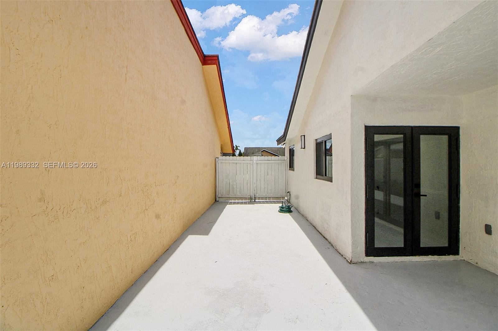 8961 Southwest 6th Street Miami, FL 33174 - Photo 20 of 26 a view of balcony with wooden floor and stairs