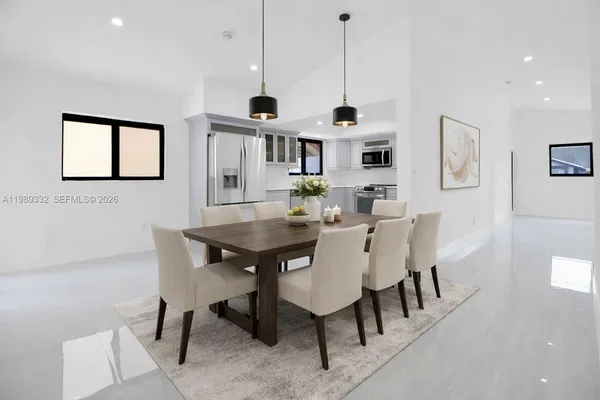 a view of a dining room with furniture