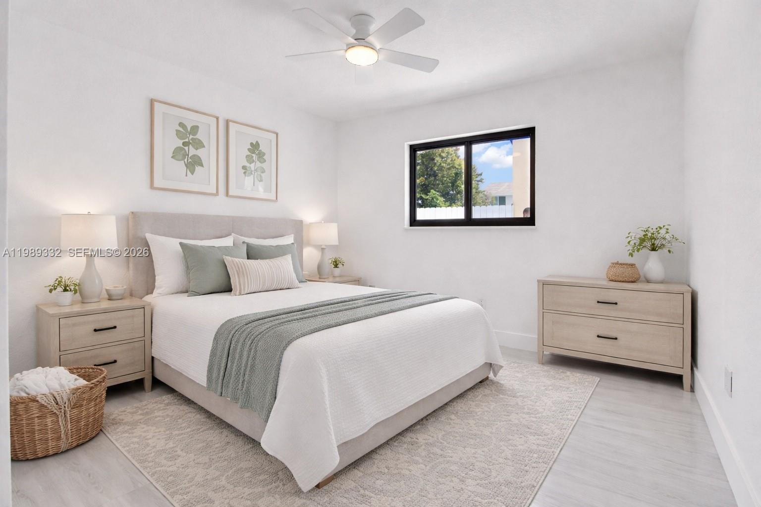 8961 Southwest 6th Street Miami, FL 33174 - Photo 8 of 26 a bedroom with a bed and a night stand