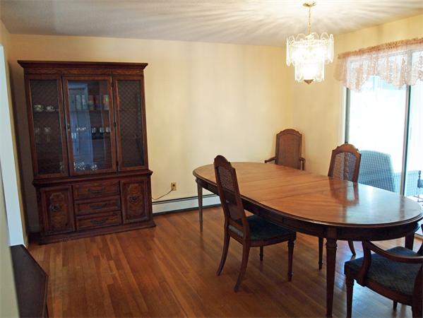 50 Oldham Road Barnstable, MA 02655 - Photo 5 of 11 a view of a dining room with furniture window and wooden floor