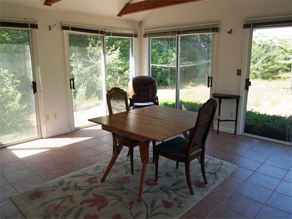 50 Oldham Road Barnstable, MA 02655 - Photo 9 of 11 a view of a dining room with furniture and a window