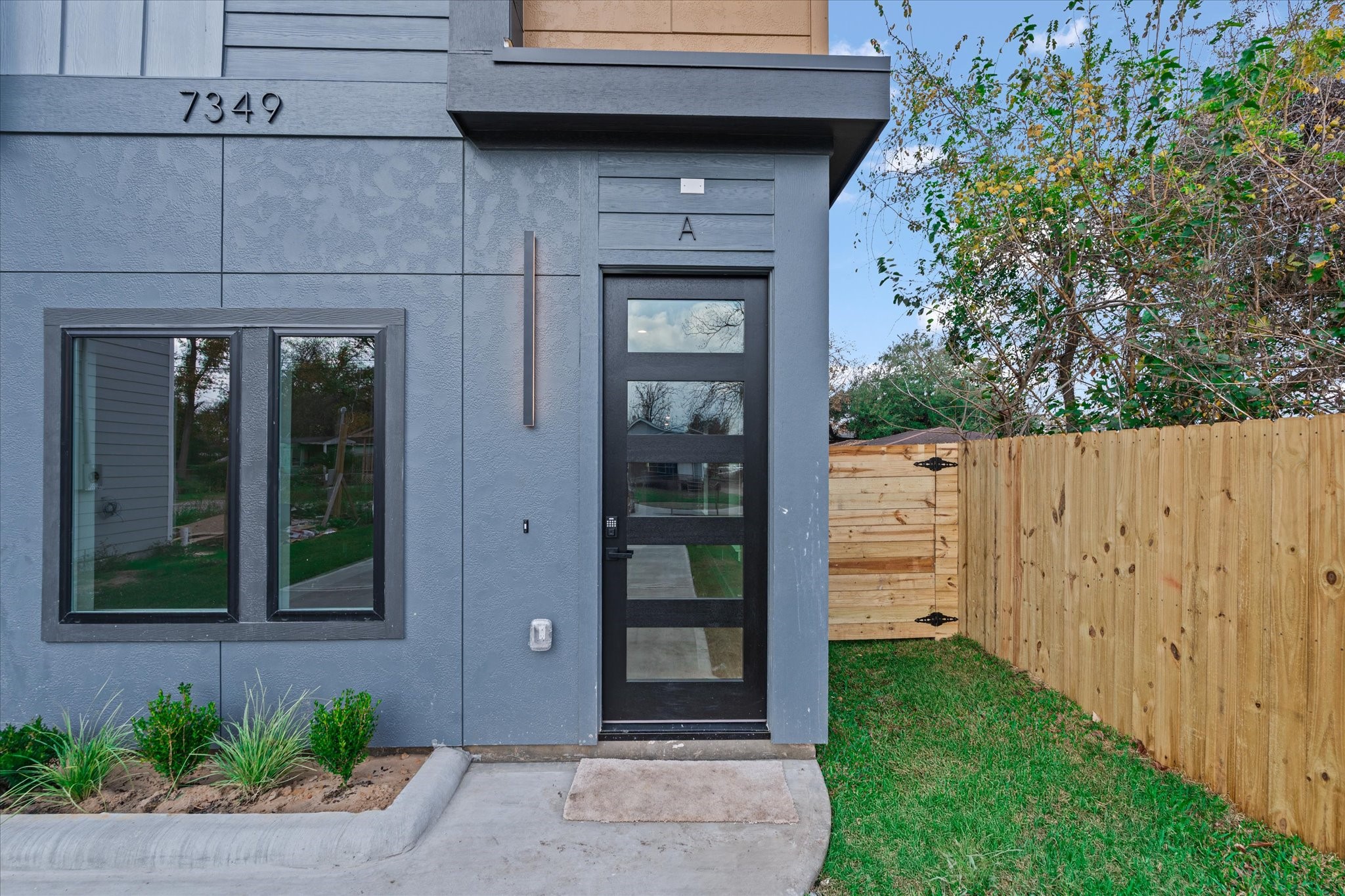 a front view of a house with a porch