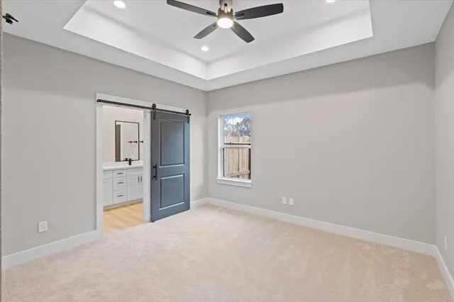 a kitchen with stainless steel appliances a refrigerator sink and cabinets