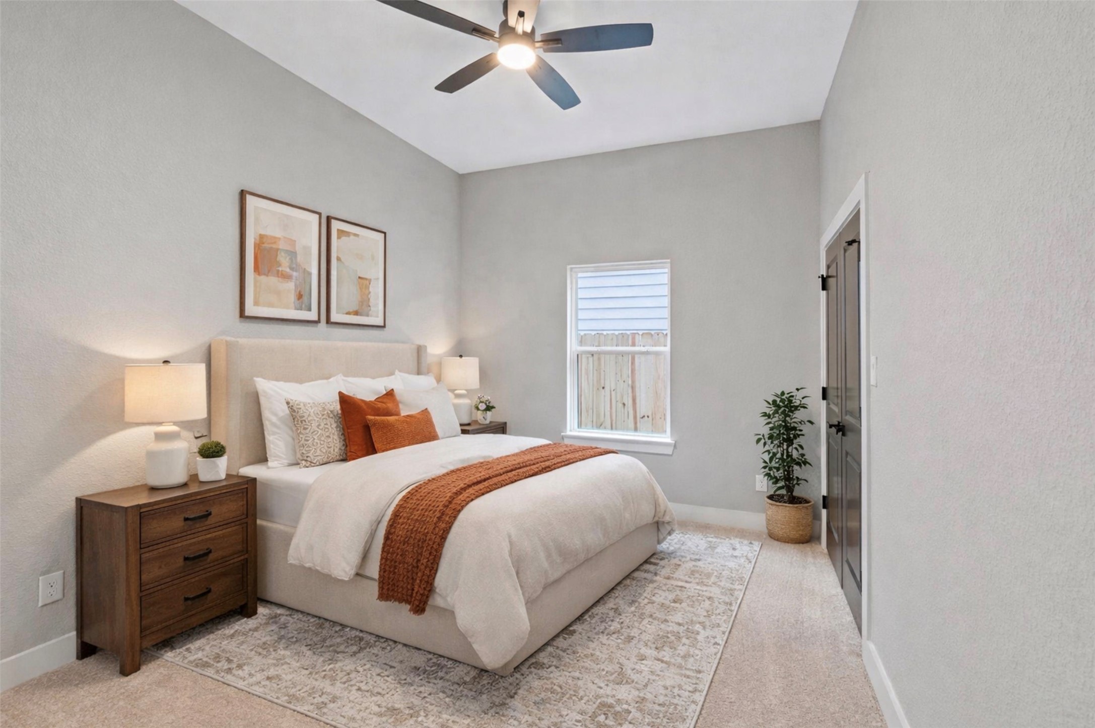 7349 Sandle Street, Unit A Houston, TX 77088 - Photo 6 of 18 a bedroom with bed and window