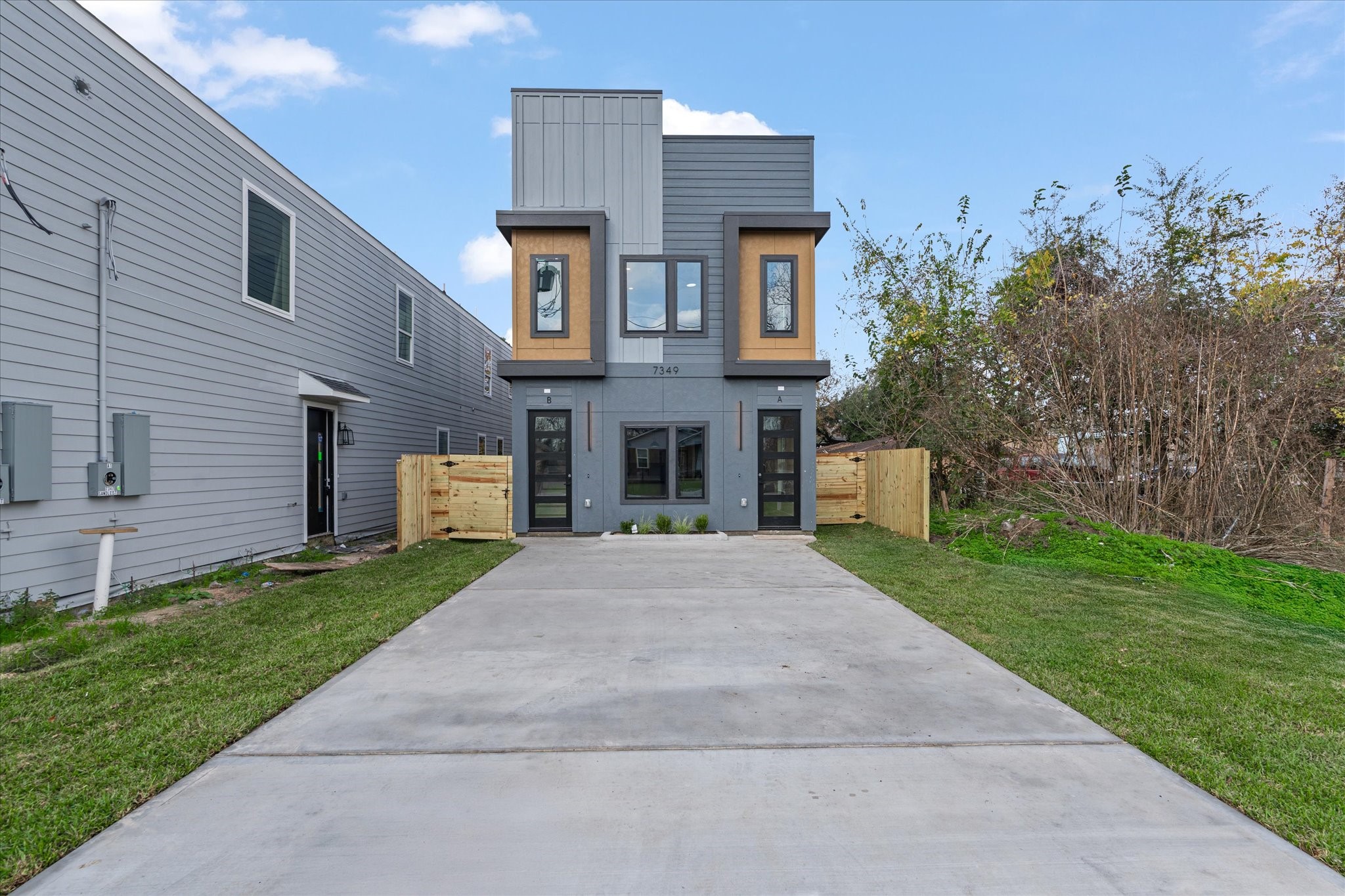 7349 Sandle Street, Unit A Houston, TX 77088 - Photo 8 of 18 front view of house with a yard