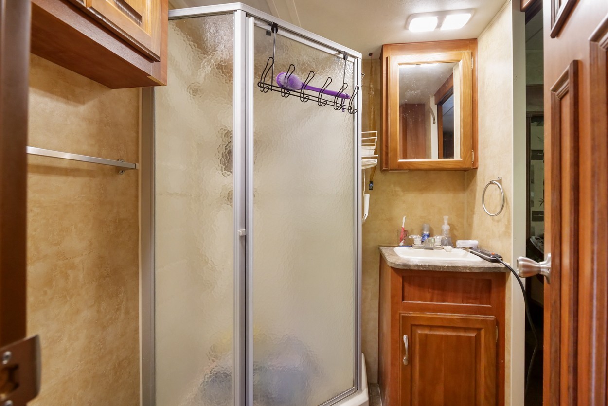1035 North Dickerson Chapel Road Lebanon, TN 37087 - Photo 14 of 19 a bathroom with a sink and mirror