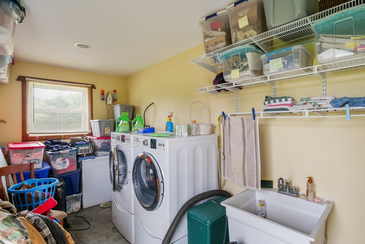 1035 North Dickerson Chapel Road Lebanon, TN 37087 - Photo 6 of 19 a view of storage and utility room with washer and dryer