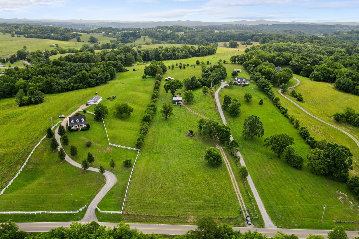 1035 North Dickerson Chapel Road Lebanon, TN 37087 - Photo 8 of 19 an aerial view of residential houses with outdoor space and a lake view