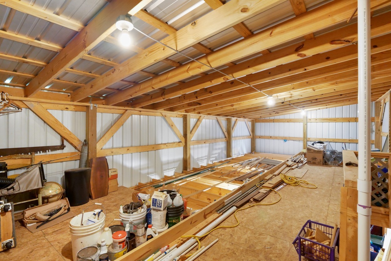 1035 North Dickerson Chapel Road Lebanon, TN 37087 - Photo 9 of 19 a bed room with a bed and a table