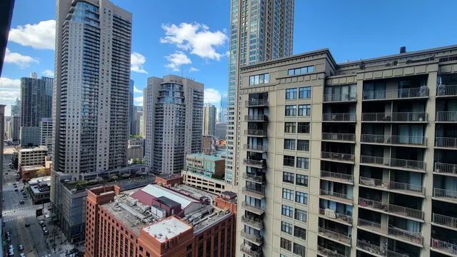 a view of a city with tall buildings