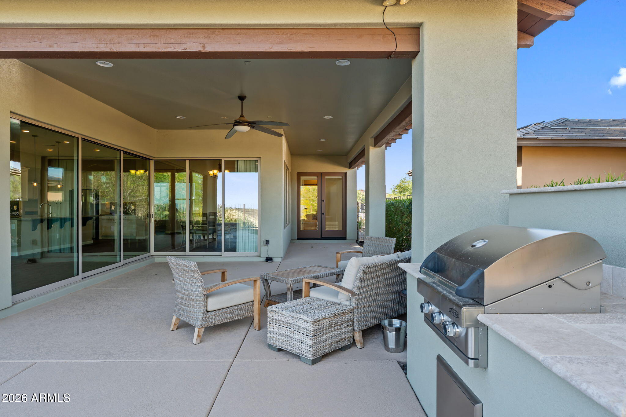 3675 Gold Ridge Road Wickenburg, AZ 85390 - Photo 34 of 58 a living room with furniture and a floor to ceiling window