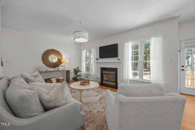 a bathroom with a sink double vanity tub and a mirror