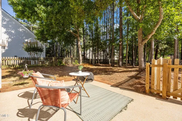 a living room with furniture fireplace and a flat screen tv
