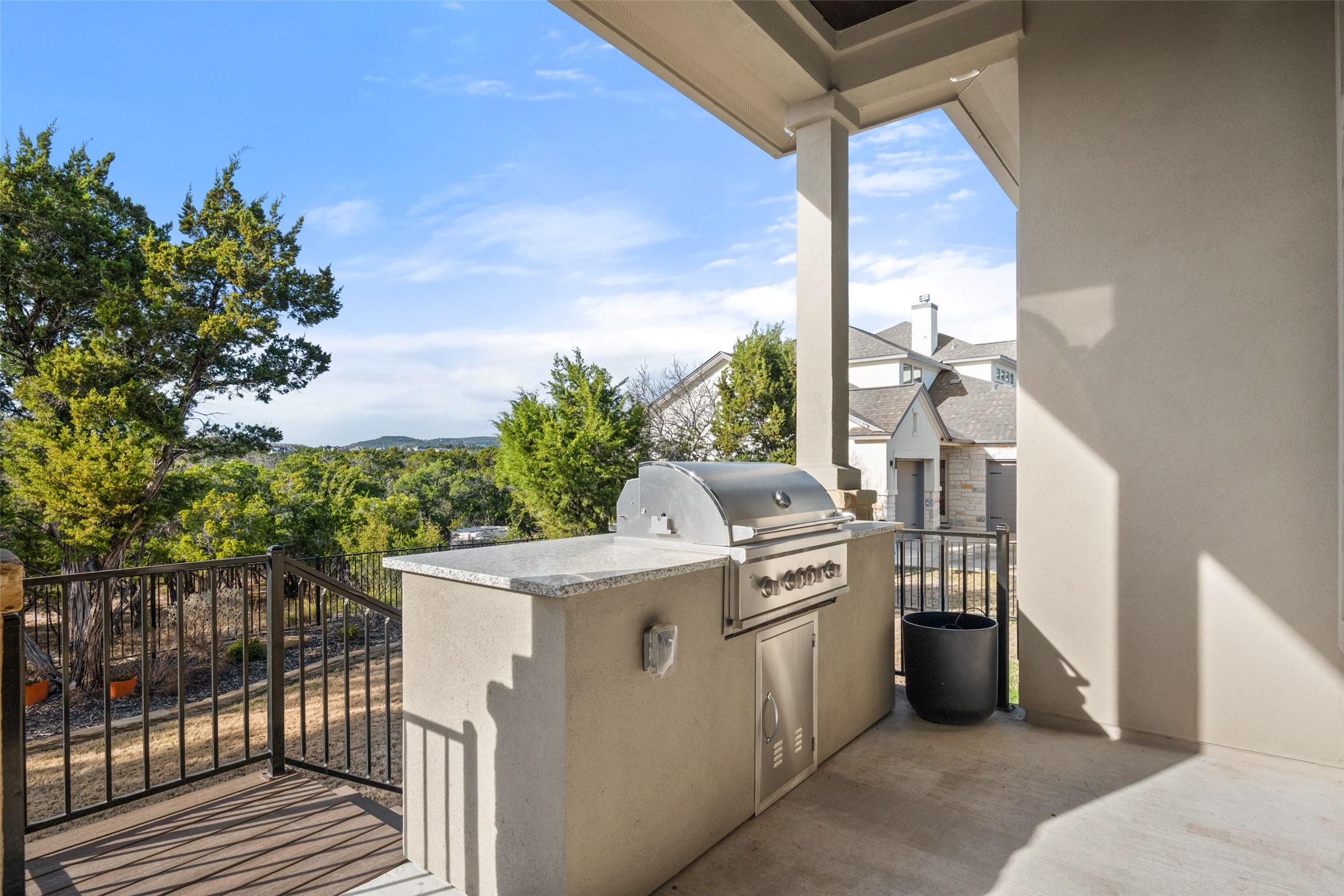 5420 Destination Way Jonestown, TX 78645 - Photo 13 of 40 Private covered back patio overlooking trees and the hill country with grill!