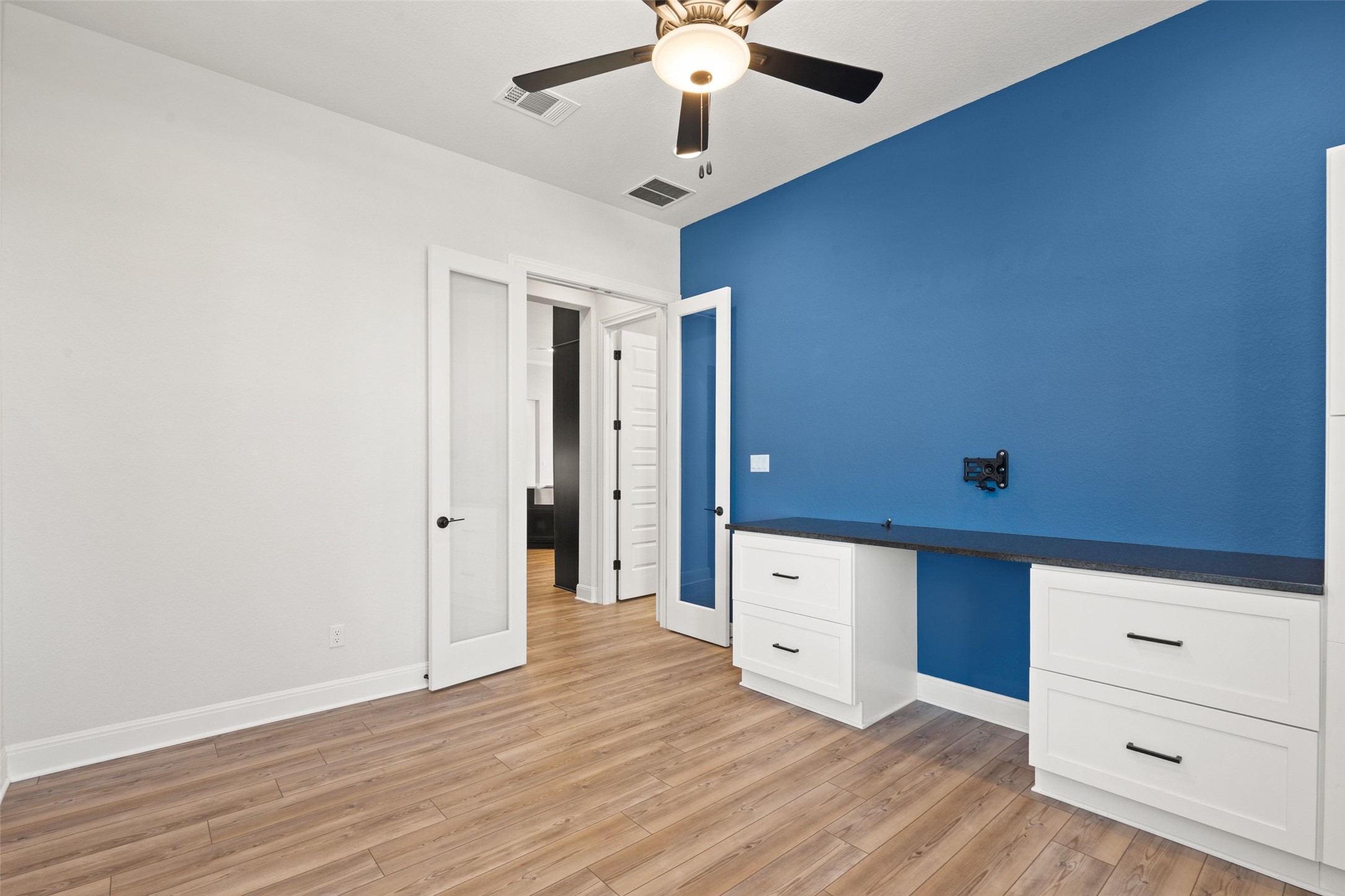 5420 Destination Way Jonestown, TX 78645 - Photo 19 of 40 Dedicted office space with built-in shelving and desk