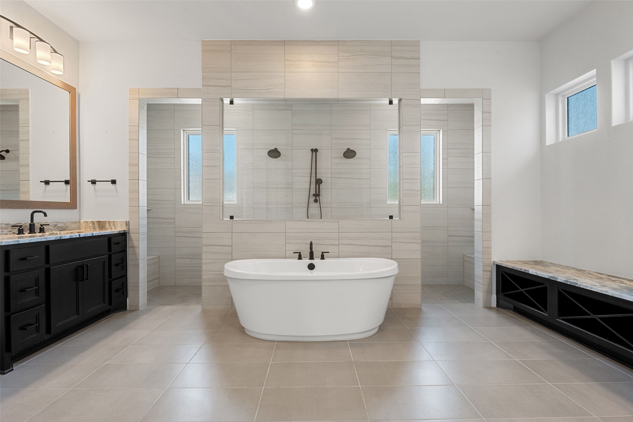 5420 Destination Way Jonestown, TX 78645 - Photo 6 of 40 Spa-like bathroom with soaking tub, double vanities, and walk-through shower