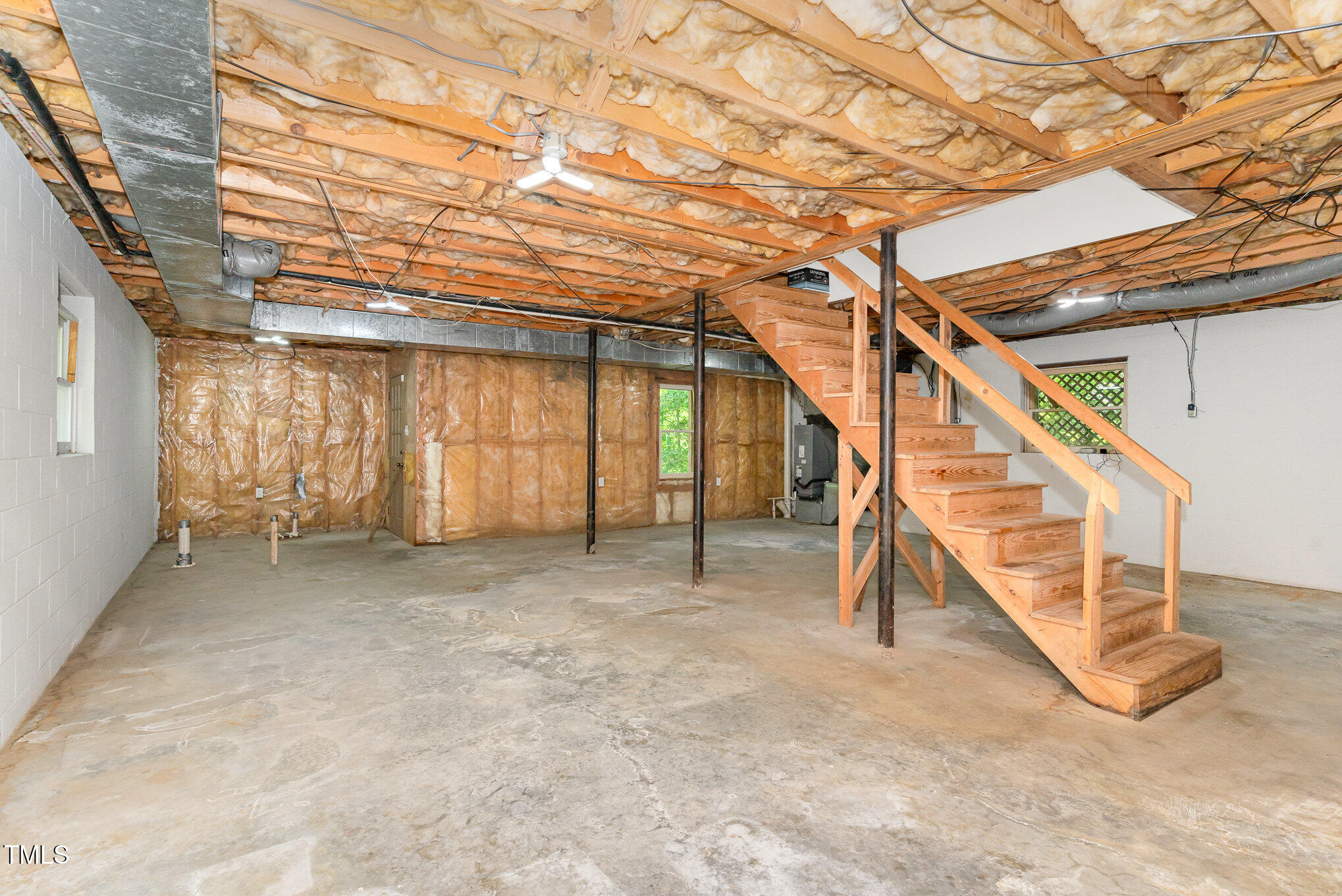 200 Weybossett Road Henderson, NC 27537 - Photo 24 of 30 a view of an empty room with stairs