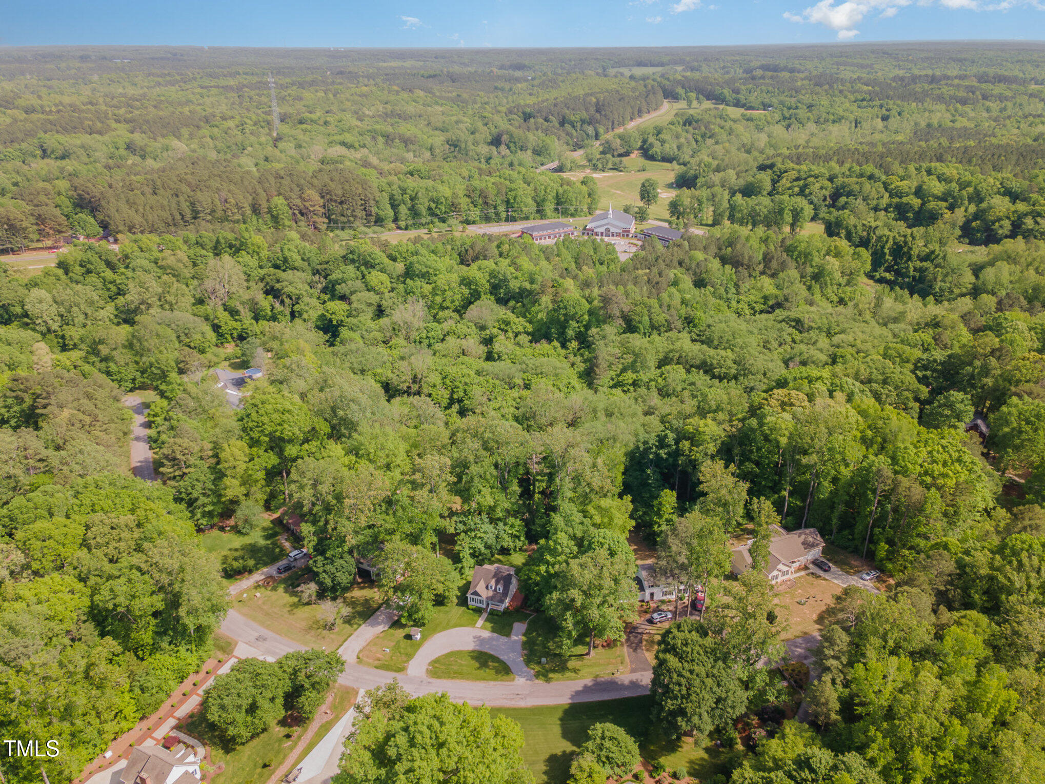 200 Weybossett Road Henderson, NC 27537 - Photo 29 of 30 an aerial view of residential houses with outdoor space and trees