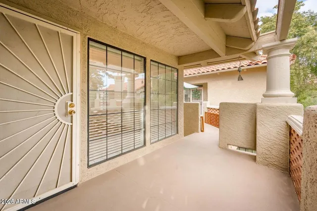 a view of a room with windows