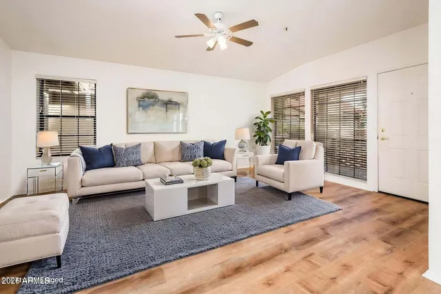 a living room with furniture and view of living room