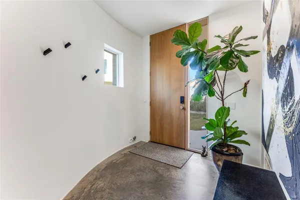 a kitchen that has a lot of cabinets