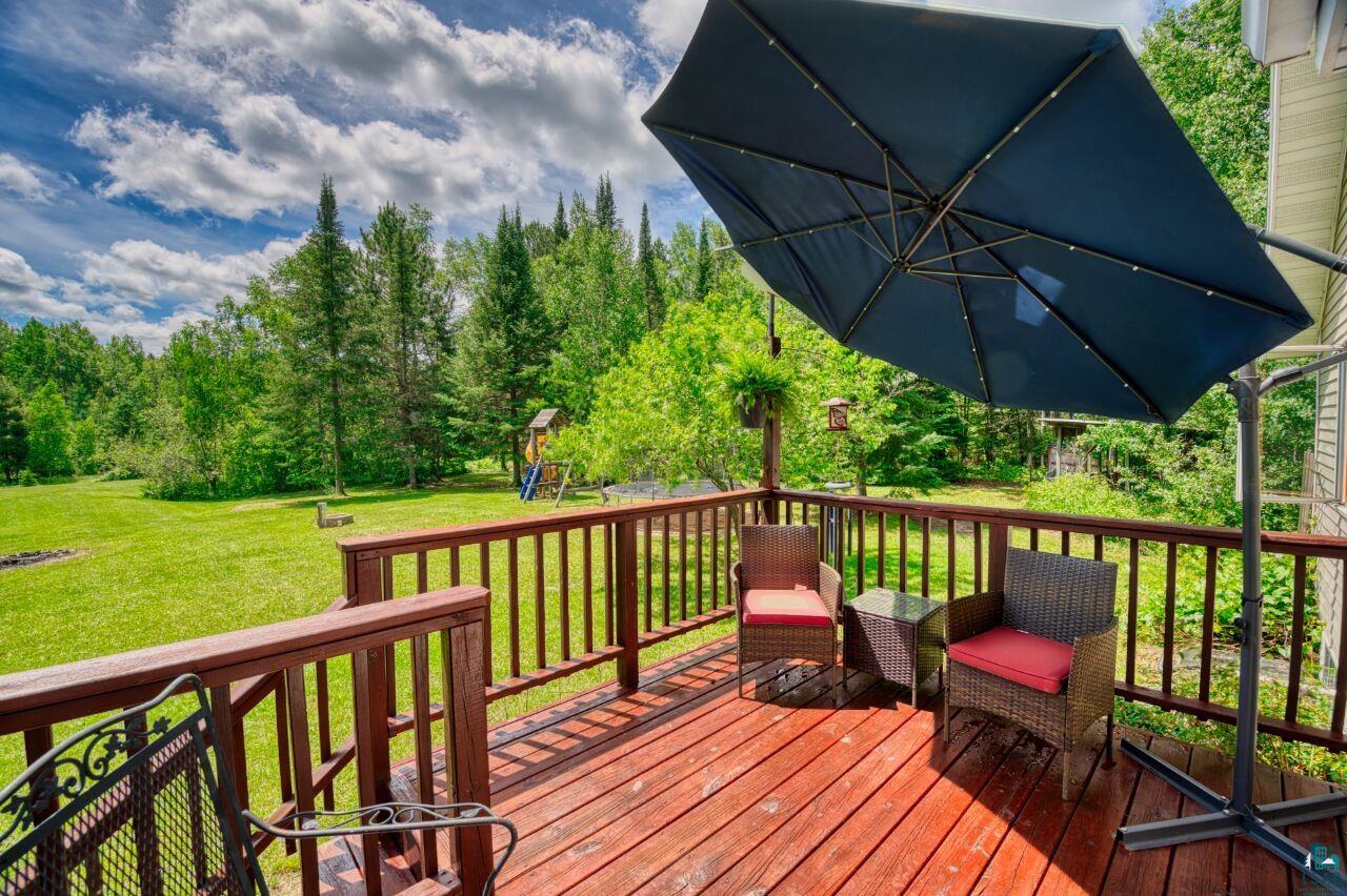 3935 Saari Road Hibbing, MN 55746 - Photo 36 of 48 Deck featuring a lawn