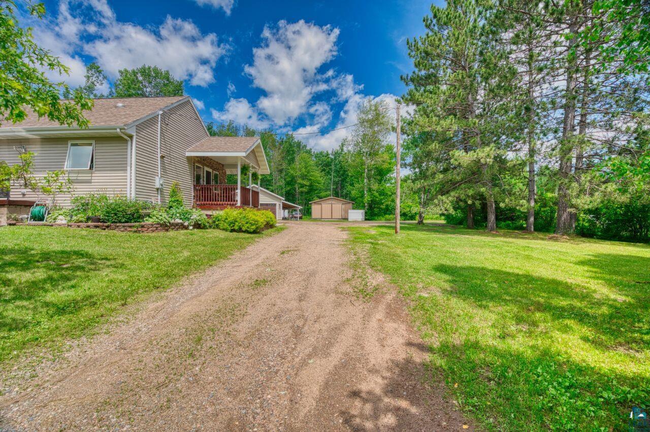 3935 Saari Road Hibbing, MN 55746 - Photo 45 of 48 View of yard with a storage unit