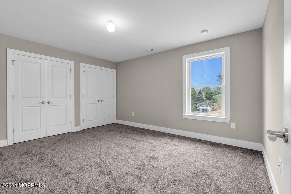 12 Sander Way Bayville, NJ 08721 - Photo 39 of 71 an empty room with a window