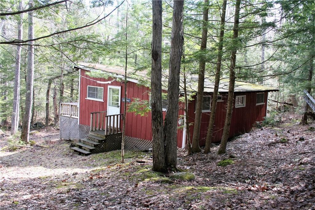 27 Beaver Dam Road Harrison, ME 04040 - Photo 2 of 27 The 24'x36' camp view from driveway