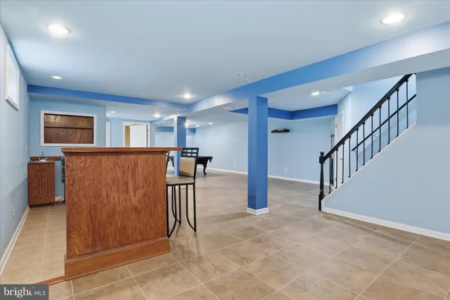a view of a hallway with a living room