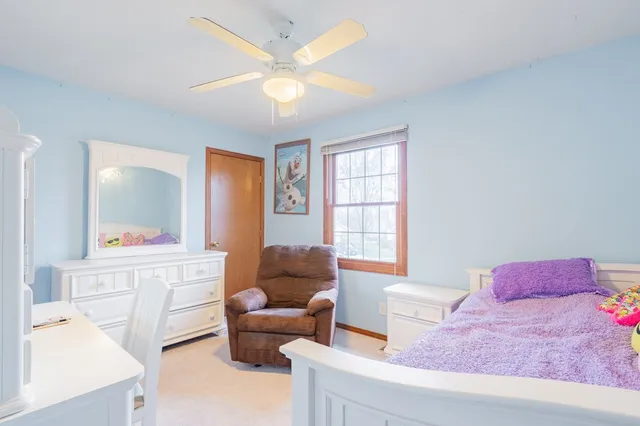a bathroom with a sink and a window
