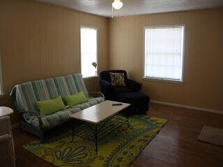 2123 25th Street Lubbock, TX 79411 - Photo 2 of 12 a living room with furniture and a window