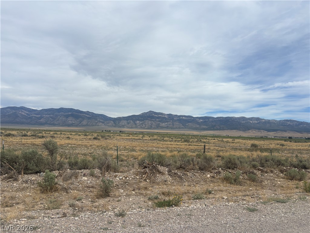 Preston Dump Road Lund, NV 89317 - Photo 7 of 7 Dramatic mountain ranges frame the horizon of this vast, open property.
