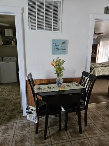 a kitchen with a stove and a microwave